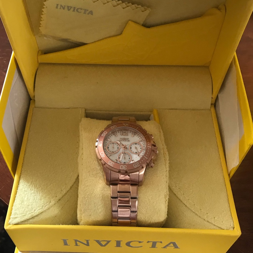 Rose gold invicta pearl face watch